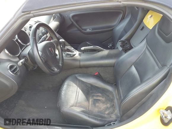 2007 Pontiac Solstice z VIN 1G2MB35B77Y132275, wystawiony jako IAAI lot #41435627 z przebiegiem 87 635 mil mil oraz . Historia ofert i sprzedaży dostępna na DreamBid. Obrazek 8.