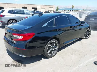 2022 Honda Accord Sport with VIN 1HGCV3F28NA034845, listed as a IAAI auction lot 42462260 with 69,163 mi miles and . Bid and sale history available at DreamBid. Image 4.