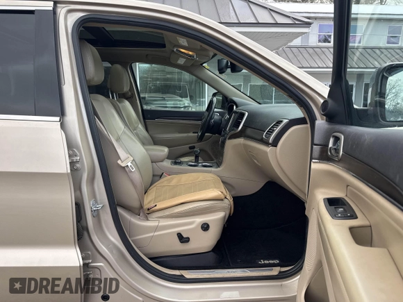 2014 Jeep Grand Cherokee Limited z VIN 1C4RJFBM2EC315721, wystawiony jako IAAI lot #41512041 z przebiegiem 180 972 mil mil oraz . Historia ofert i sprzedaży dostępna na DreamBid. Obrazek 5.