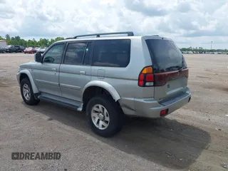 2001 Mitsubishi Montero Limited z VIN JA4LS41R41P013333, wystawiony jako IAAI lot #42361683 z przebiegiem 257 906 mil mil oraz . Historia ofert i sprzedaży dostępna na DreamBid. Obrazek 3.