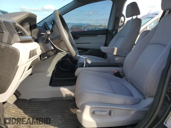 2018 Honda Odyssey LX with VIN 5FNRL6H22JB074305, listed as a Copart auction lot 42390885 with 77,054 mi miles and Salvage Title. Bid and sale history available at carsss.com. Image 7.
