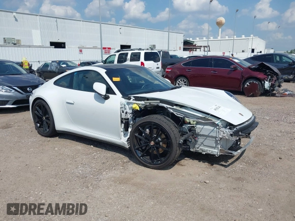 2022 Porsche 911 Carrera with VIN WP0AA2A91NS206000, listed as a IAAI auction lot 40382242 with 26,394 mi miles. Bid and sale history available at carsss.com. Image 1.