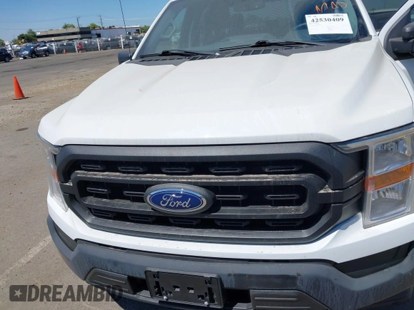 2021 Ford F-150 XL with VIN 1FTFW1CD1MFB31373, listed as a IAAI auction lot 42530409 with 119,956 mi miles and . Bid and sale history available at DreamBid. Image 6.