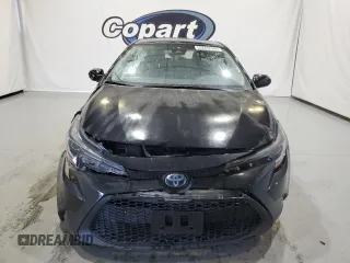 2021 Toyota Corolla Hybrid LE with VIN JTDEAMDE3MJ007296, listed as a Copart auction lot 44492055 with 96,373 mi miles and Clean Title. Bid and sale history available at carsss.com. Image 5.