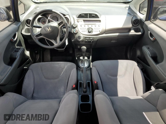 2009 Honda Fit with VIN JHMGE882X9C003678, listed as a Copart auction lot 56688265 with 141,003 mi miles and Salvage title. Bid and sale history available at DreamBid. Image 8.