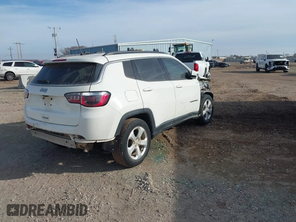 2019 Jeep Compass Latitude with VIN 3C4NJCBB1KT654692, listed as a IAAI auction lot 41376045 with 132,038 mi miles and . Bid and sale history available at DreamBid. Image 4.