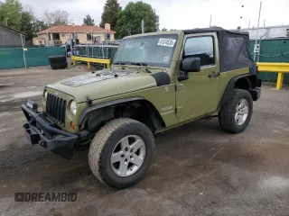 2013 Jeep Wrangler Sport with VIN 1C4AJWAGXDL586971, listed as a Copart auction lot 61574535 with 178,927 mi miles and Clean title. Bid and sale history available at DreamBid. Image 1.