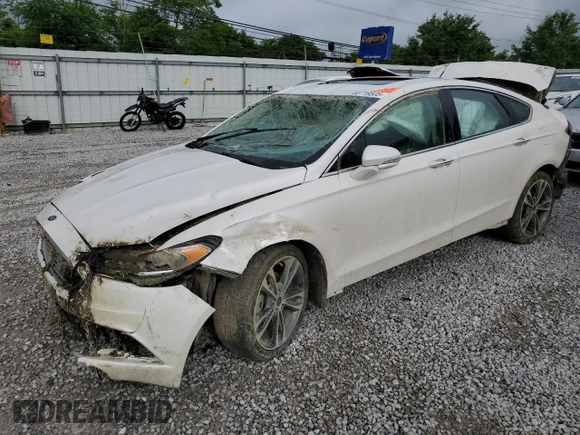 2017 Ford Fusion Titanium z VIN 3FA6P0K93HR227511, wystawiony jako Copart lot #60719505 z przebiegiem Nie podano mil oraz Szkoda całkowita • Salvage title. Historia ofert i sprzedaży dostępna na DreamBid. Obrazek 1.