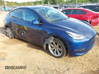 2022 Tesla Model Y Long Range z VIN 7SAYGDEE0NF429399, wystawiony jako IAAI lot #42333630 z przebiegiem 32 937 mil mil oraz . Historia ofert i sprzedaży dostępna na DreamBid. Obrazek 1.