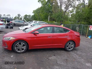2017 Hyundai Elantra SE z VIN 5NPD84LF7HH052757, wystawiony jako IAAI lot #41409185 z przebiegiem 179 954 mil mil oraz . Historia ofert i sprzedaży dostępna na DreamBid. Obrazek 14.