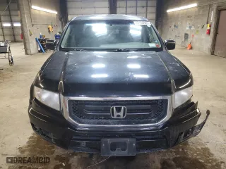 2009 Honda Ridgeline RT with VIN 5FPYK162X9B104173, listed as a Copart auction lot 43140925 with 164,071 mi miles and Salvage Title. Bid and sale history available at carsss.com. Image 5.