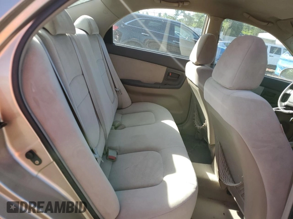 2006 Kia Spectra EX z VIN KNAFE121365269433, wystawiony jako Copart lot #56634735 z przebiegiem 86 551 mil mil oraz Szkoda całkowita • Salvage title. Historia ofert i sprzedaży dostępna na DreamBid. Obrazek 10.
