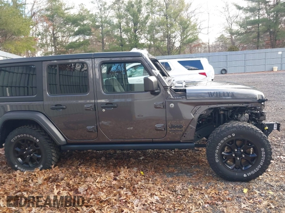2021 Jeep Wrangler Unlimited Sport S with VIN 1C4HJXDN4MW518307, listed as a IAAI auction lot 41222996 with 39,499 mi miles and . Bid and sale history available at DreamBid. Image 13.