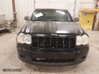 2008 Jeep Grand Cherokee Laredo with VIN 1J8GR48K08C138979, listed as a IAAI auction lot 41081490 with 191,733 mi miles. Bid and sale history available at carsss.com. Image 6.