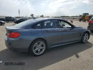 2016 BMW 4 Series 428i xDrive with VIN WBA4C9C50GG137720, listed as a Copart auction lot 50240545 with 60,705 mi miles and Salvage Title. Bid and sale history available at DreamBid. Image 3.