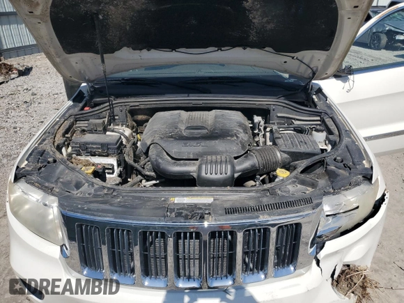 2011 Jeep Grand Cherokee Laredo with VIN 1J4RR4GG8BC724196, listed as a Copart auction lot 51760195 with 79,407 mi miles and Salvage Title. Bid and sale history available at DreamBid. Image 12.