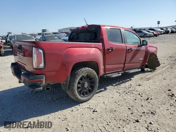 2022 GMC Canyon 4WD AT4 z VIN 1GTG6FEN9N1111989, wystawiony jako Copart lot #52967635 z przebiegiem 39 389 mil mil oraz Szkoda całkowita • Salvage title. Historia ofert i sprzedaży dostępna na DreamBid. Obrazek 3.