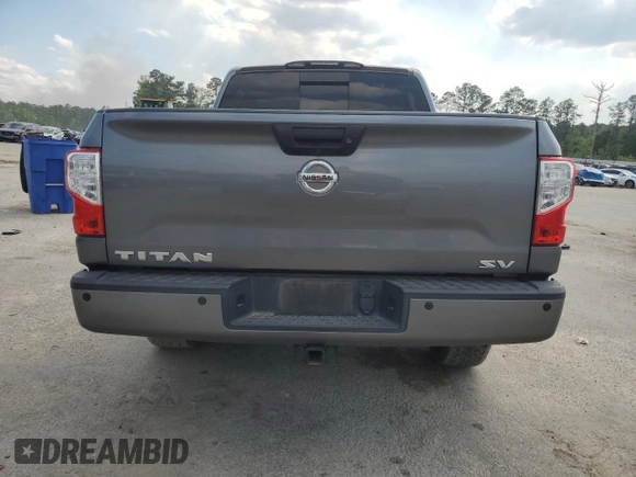 2018 Nissan Titan SV with VIN 1N6AA1E65JN509510, listed as a Copart auction lot 52459525 with 65,164 mi miles and Salvage Title. Bid and sale history available at carsss.com. Image 6.