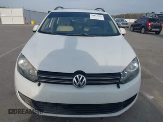 2014 Volkswagen Jetta TDI w/Sunroof & Nav with VIN 3VWPL7AJ7EM617385, listed as a IAAI auction lot 42012881 with 98,015 mi miles and . Bid and sale history available at DreamBid. Image 6.