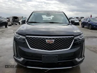 2021 Cadillac XT6 Premium Luxury z VIN 1GYKPCRS6MZ207546, wystawiony jako Copart lot #85995814 z przebiegiem 30 885 mil mil oraz Czysty tytuł • Clean title. Historia ofert i sprzedaży dostępna na DreamBid. Obrazek 5.