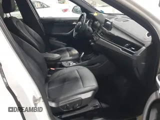 2021 BMW X1 xDrive28i with VIN WBXJG9C04M5T82884, listed as a IAAI auction lot 42242890 with 24,647 mi miles and . Bid and sale history available at DreamBid. Image 5.