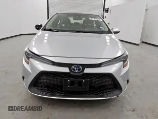 2021 Toyota Corolla Hybrid LE with VIN JTDEAMDE4MJ009929, listed as a Copart auction lot 59626985 with 91,817 mi miles and Clean title. Bid and sale history available at DreamBid. Image 5.