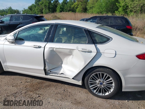 2014 Ford Fusion SE with VIN 3FA6P0H92ER340353, listed as a IAAI auction lot 42126171 with 104,484 mi miles and . Bid and sale history available at DreamBid. Image 6.