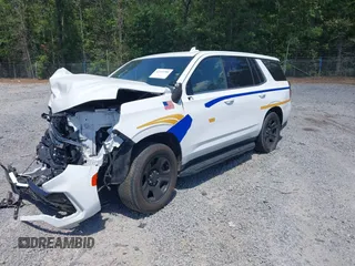 2022 Chevrolet Tahoe Commercial z VIN 1GNSCLED4NR222340, wystawiony jako IAAI lot #42321388 z przebiegiem Nie podano mil oraz . Historia ofert i sprzedaży dostępna na DreamBid. Obrazek 2.