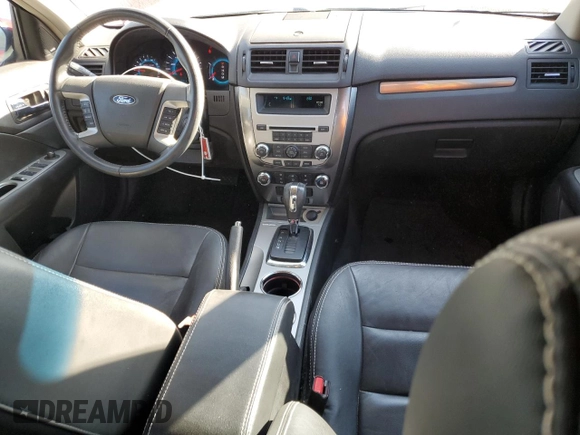 2012 Ford Fusion SEL z VIN 3FAHP0JG8CR435577, wystawiony jako Copart lot #79741724 z przebiegiem 145 023 mil mil oraz Szkoda całkowita • Salvage title. Historia ofert i sprzedaży dostępna na DreamBid. Obrazek 8.