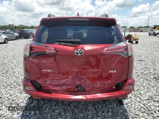 2018 Toyota RAV4 XLE with VIN 2T3WFREV7JW477541, listed as a Copart auction lot 64756575 with 59,779 mi miles and Salvage title. Bid and sale history available at DreamBid. Image 6.