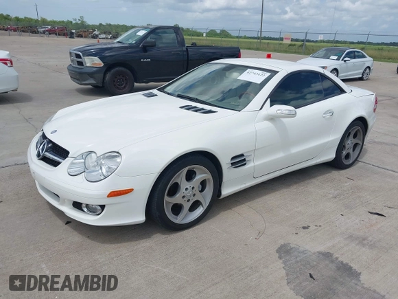 2007 Mercedes-Benz SL 550 with VIN WDBSK71F57F126438, listed as a IAAI auction lot 42743122 with 62,978 mi miles and . Bid and sale history available at DreamBid. Image 2.