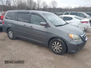 2009 Honda Odyssey EX-L with VIN 5FNRL38759B018087, listed as a IAAI auction lot 41738455 with 193,006 mi miles. Bid and sale history available at carsss.com. Image 1.