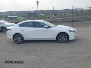 2019 Mazda 3 Preferred with VIN 3MZBPADL4KM106317, listed as a IAAI auction lot 42007588 with 45,470 mi miles and . Bid and sale history available at DreamBid. Image 13.