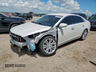 2018 Cadillac XTS Luxury with VIN 2G61M5S31J9124558, listed as a Copart auction lot 62873275 with 142,727 mi miles and Salvage title. Bid and sale history available at DreamBid. Image 1.
