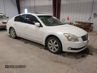 2005 Nissan Maxima SE z VIN 1N4BA41E55C816849, wystawiony jako IAAI lot #40978612 z przebiegiem 127 952 mil mil oraz . Historia ofert i sprzedaży dostępna na DreamBid. Obrazek 1.