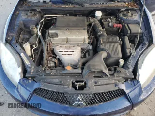 2009 Mitsubishi Eclipse GS z VIN 4A3AK24F99E041989, wystawiony jako Copart lot #88069855 z przebiegiem 106 395 mil mil oraz Szkoda całkowita • Salvage title. Historia ofert i sprzedaży dostępna na DreamBid. Obrazek 11.