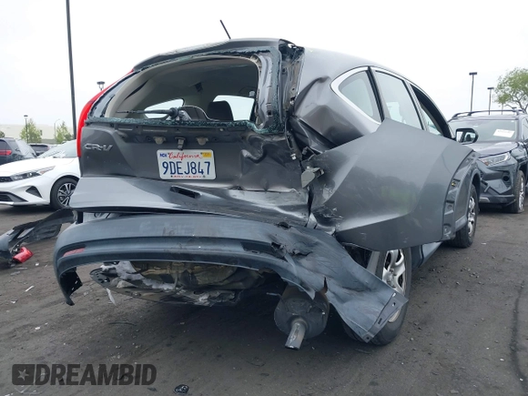 2014 Honda CR-V LX with VIN 2HKRM3H37EH522033, listed as a IAAI auction lot 42139386 with 156,214 mi miles. Bid and sale history available at carsss.com. Image 6.