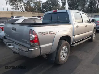 2015 Toyota Tacoma PreRunner with VIN 3TMJU4GN1FM184419, listed as a IAAI auction lot 41102082 with 52,726 mi miles and . Bid and sale history available at DreamBid. Image 4.