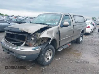 2001 Ford F-150 XL with VIN 1FTRF18W11NA61110, listed as a IAAI auction lot 42288546 with Not provided miles and . Bid and sale history available at DreamBid. Image 17.
