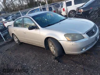 2006 Nissan Altima 2.5 with VIN 1N4AL11D06N385807, listed as a IAAI auction lot 41818211 with 999,999 mi miles. Bid and sale history available at carsss.com. Image 1.