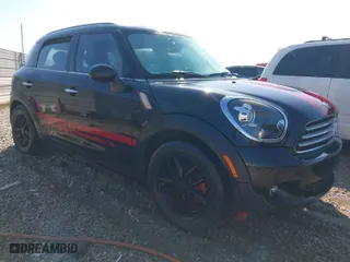 2012 MINI Cooper Countryman with VIN WMWZB3C58CWM30013, listed as a IAAI auction lot 41982899 with 147,431 mi miles. Bid and sale history available at carsss.com. Image 1.