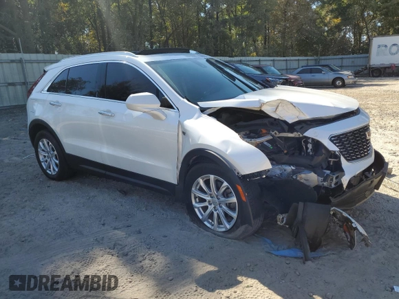2019 Cadillac XT4 FWD Luxury z VIN 1GYAZAR45KF110798, wystawiony jako Copart lot #58872555 z przebiegiem 31 631 mil mil oraz Nie do naprawy • Non repairable. Historia ofert i sprzedaży dostępna na DreamBid. Obrazek 4.
