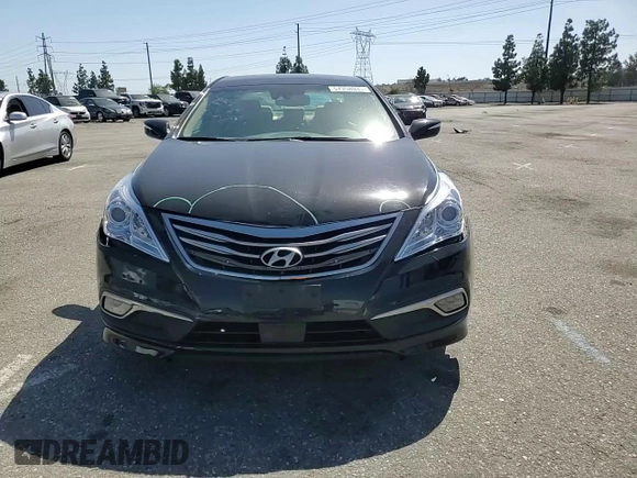 2017 Hyundai Azera Limited z VIN KMHFH4JG1HA590961, wystawiony jako Copart lot #57358035 z przebiegiem 66 985 mil mil oraz Szkoda całkowita • Salvage title. Historia ofert i sprzedaży dostępna na DreamBid. Obrazek 13.