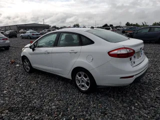 2015 Ford Fiesta SE with VIN 3FADP4BJ2FM219659, listed as a Copart auction lot 52304875 with 67,460 mi miles and Salvage Title. Bid and sale history available at carsss.com. Image 2.
