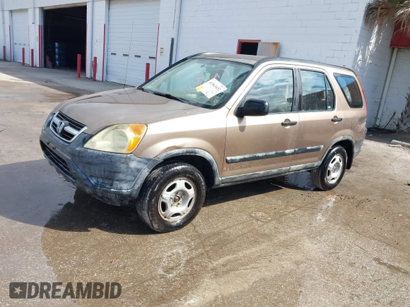 2003 Honda CR-V LX with VIN JHLRD68513C009276, listed as a IAAI auction lot 41563452 with 240,519 mi miles and . Bid and sale history available at DreamBid. Image 2.