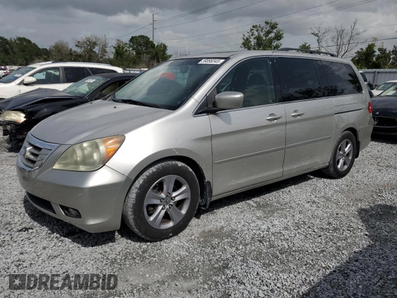 2008 Honda Odyssey Touring z VIN 5FNRL38978B062320, wystawiony jako Copart lot #59898345 z przebiegiem 229 760 mil mil oraz Czysty tytuł • Clean title. Historia ofert i sprzedaży dostępna na DreamBid. Obrazek 1.