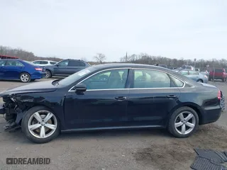 2012 Volkswagen Passat SE with VIN 1VWBP7A37CC021336, listed as a IAAI auction lot 41724459 with 124,832 mi miles. Bid and sale history available at carsss.com. Image 13.