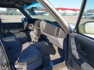 1997 Jeep Cherokee Sport with VIN 1J4FJ68S3VL551278, listed as a IAAI auction lot 41660577 with 282,264 mi miles. Bid and sale history available at carsss.com. Image 5.