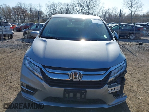 2018 Honda Odyssey Elite z VIN 5FNRL6H91JB070355, wystawiony jako IAAI lot #41975916 z przebiegiem 147 022 mil mil oraz . Historia ofert i sprzedaży dostępna na DreamBid. Obrazek 13.
