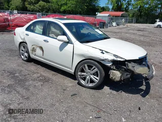 2005 Acura TSX with VIN JH4CL96885C033368, listed as a IAAI auction lot 42316386 with 338,591 mi miles and . Bid and sale history available at DreamBid. Image 1.